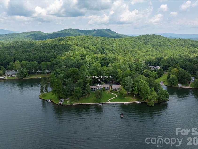 68 Toxaway Point, Lake Toxaway, NC 28747.  MLS# CAR4409256, YatesRealty ID 9348. 