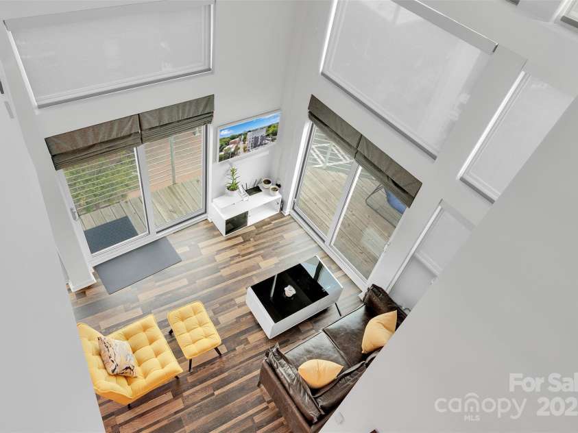 3123 Davidson Street, Charlotte, NC 28205.  MLS# CAR4298874, YatesRealty ID 9350. View from loft to downstairs