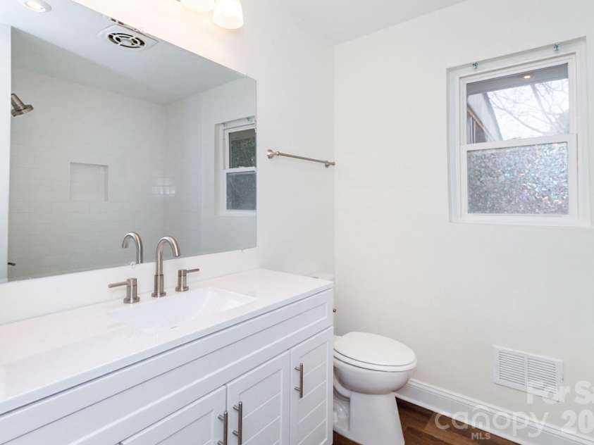 1701 Irma Street, Charlotte, NC 28216.  MLS# CAR4343874, YatesRealty ID 9353. Hallway bath