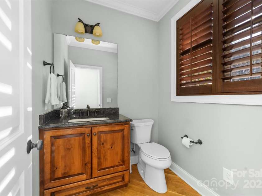 404 Yorkfield Drive, Shelby, NC 28150.  MLS# CAR4205572, YatesRealty ID 9353. Main level half bathroom just off the kitchen area.