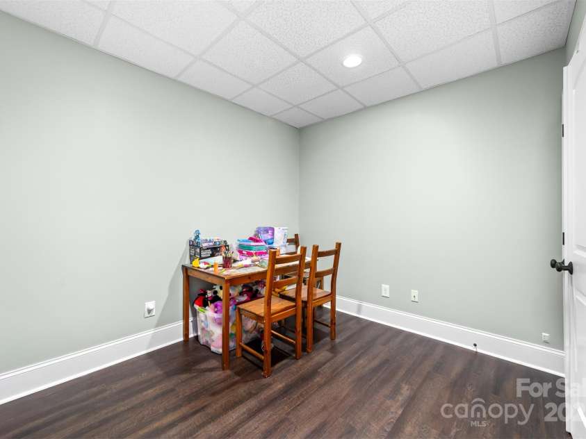 404 Yorkfield Drive, Shelby, NC 28150.  MLS# CAR4205572, YatesRealty ID 9353. One of two flex rooms in the basement with a large closet.