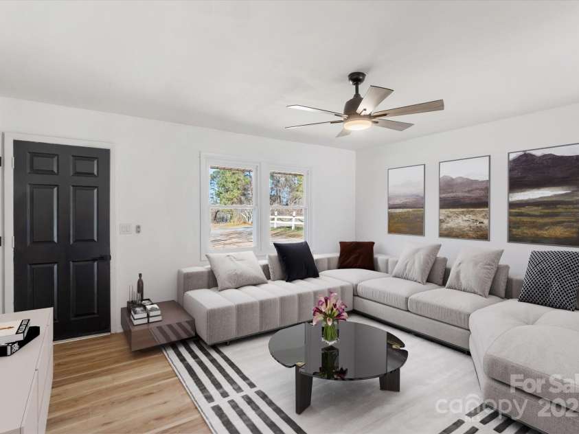 548 Old Wagy Road, Forest City, NC 28043.  MLS# CAR4217858, YatesRealty ID 9356. Virtually staged living room