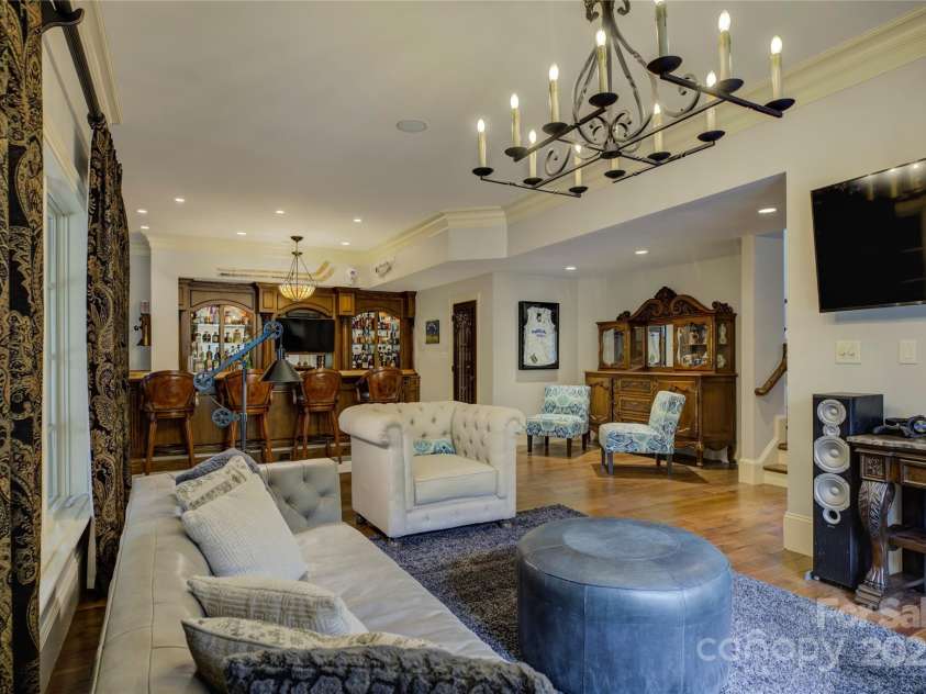 16908 Ashton Oaks Drive, Charlotte, NC 28278.  MLS# CAR4198015, YatesRealty ID 9358. Lower level living room