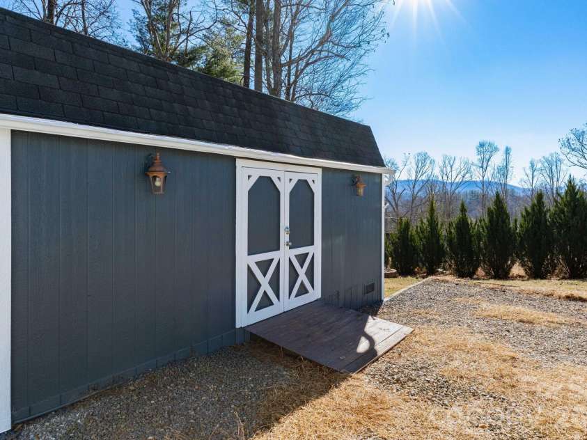 7 McGee Ridge Road, Fairview, NC 28730.  MLS# CAR4327576, YatesRealty ID 9362. Large storage shed. 