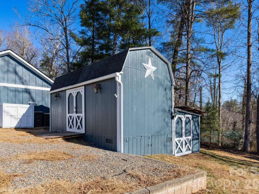 7 McGee Ridge Road, Fairview, NC 28730.  MLS# CAR4327576, YatesRealty ID 9362. Large storage shed. 
