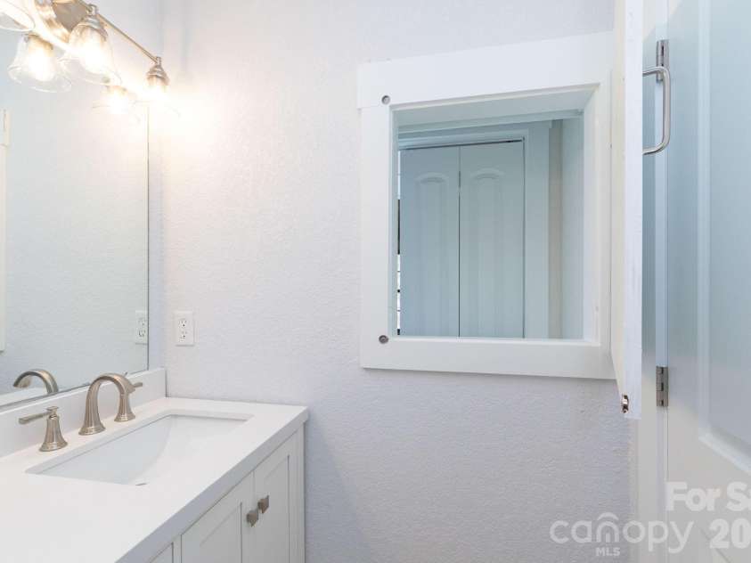 7 McGee Ridge Road, Fairview, NC 28730.  MLS# CAR4327576, YatesRealty ID 9362. Linen closet. 
