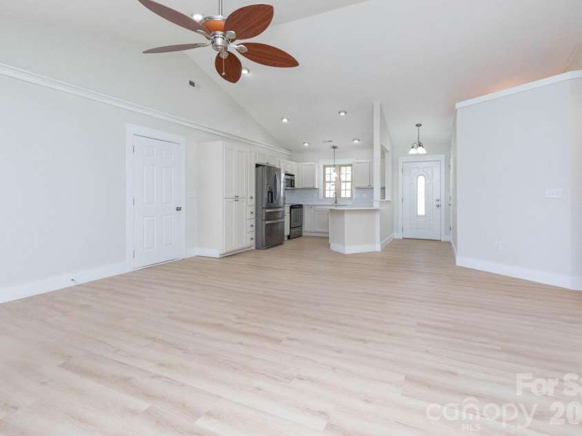 7 McGee Ridge Road, Fairview, NC 28730.  MLS# CAR4327576, YatesRealty ID 9362. Open and bright living space with cathedral ceilings.
