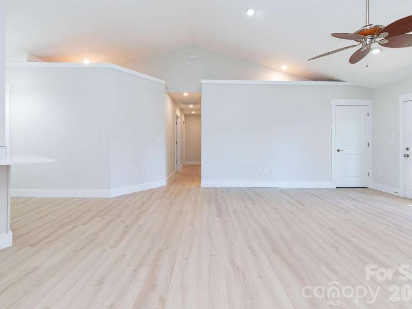 7 McGee Ridge Road, Fairview, NC 28730.  MLS# CAR4327576, YatesRealty ID 9362. Open floor plan. New LVP Vesinet Oak flooring. 
