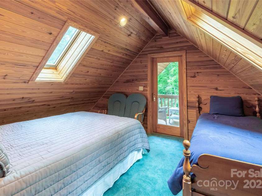 278 Talisi Trail, Whittier, NC 28789.  MLS# CAR4240743, YatesRealty ID 9363. Bedroom down hallway from loft