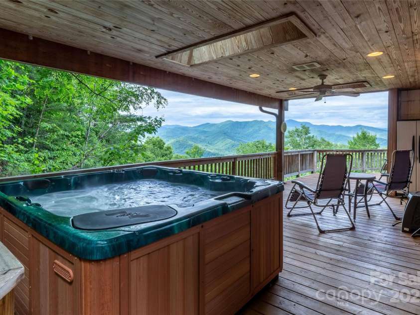 278 Talisi Trail, Whittier, NC 28789.  MLS# CAR4240743, YatesRealty ID 9363. Covered Deck outside primary bedroom
