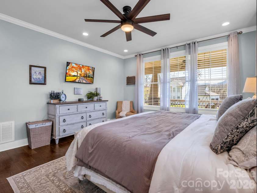 52 Old Spring Drive, Candler, NC 28715.  MLS# CAR4360930, YatesRealty ID 9363. Primary suite provides tranquility and peace, creating a calm luxurious feel and all-year Southern views out the windows