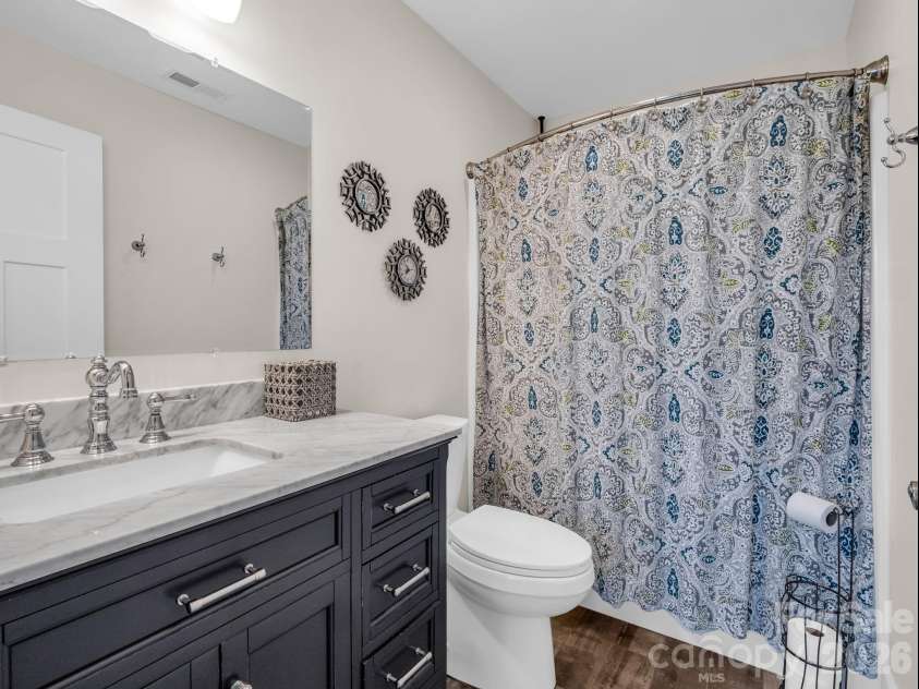 52 Old Spring Drive, Candler, NC 28715.  MLS# CAR4360930, YatesRealty ID 9363. Upstairs full bathroom