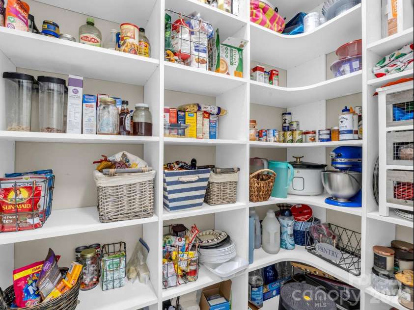 52 Old Spring Drive, Candler, NC 28715.  MLS# CAR4360930, YatesRealty ID 9363. Walk-in pantry