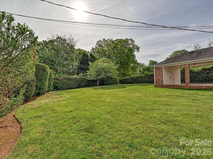 3927 Barclay Downs Drive, Charlotte, NC 28209.  MLS# CAR4356826, YatesRealty ID 9366. Backyard