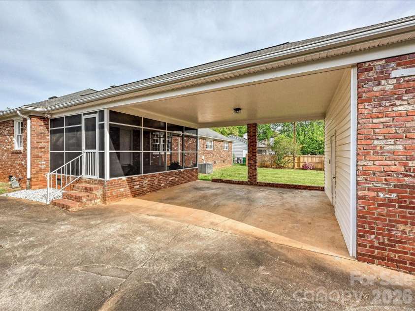 3927 Barclay Downs Drive, Charlotte, NC 28209.  MLS# CAR4356826, YatesRealty ID 9366. Carport