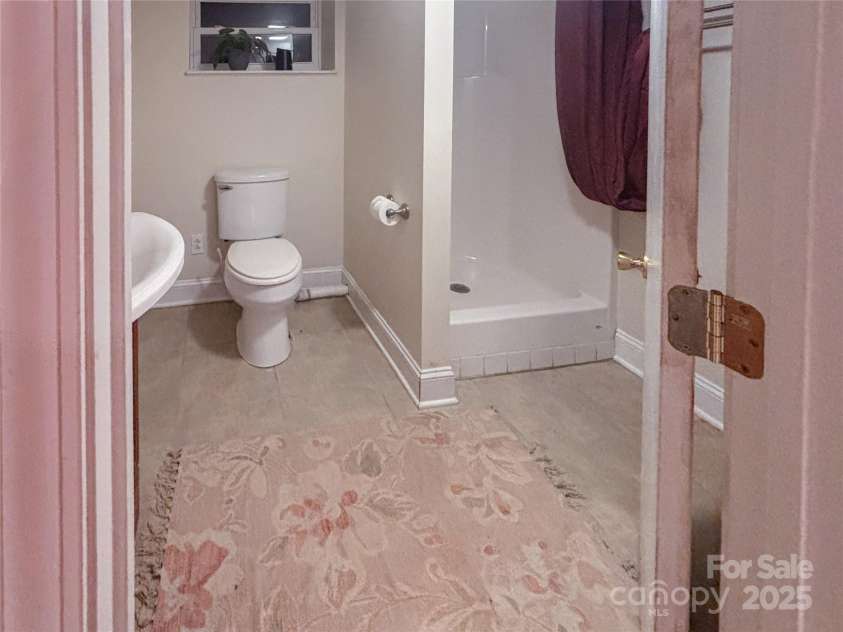 45 Armstrong Road, Etowah, NC 28729.  MLS# CAR4276177, YatesRealty ID 9369. Basement bathroom with shower