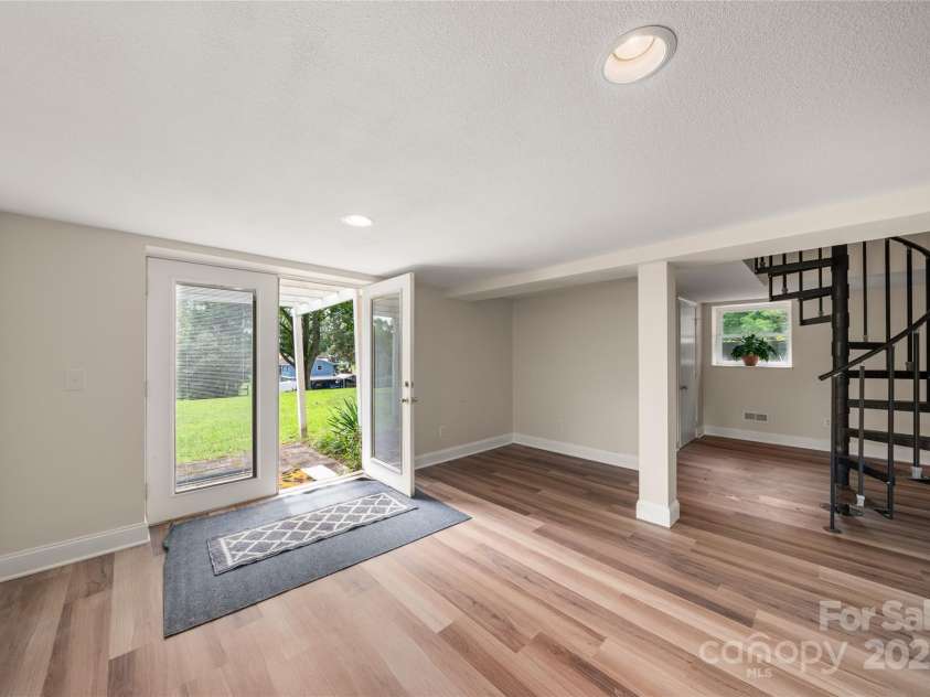 45 Armstrong Road, Etowah, NC 28729.  MLS# CAR4276177, YatesRealty ID 9369. Basement has 2 ways to enter. from upstairs or from outside