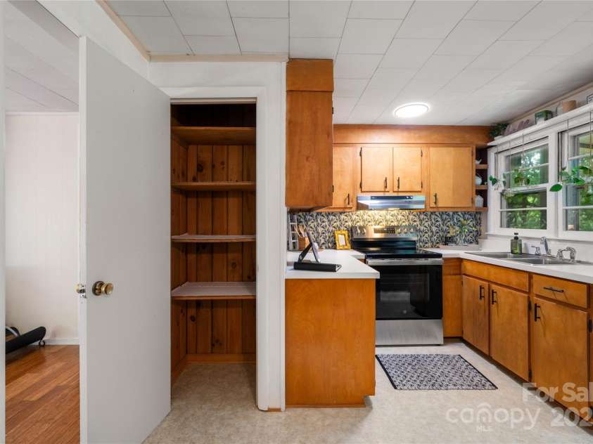 45 Armstrong Road, Etowah, NC 28729.  MLS# CAR4276177, YatesRealty ID 9369. Pantry