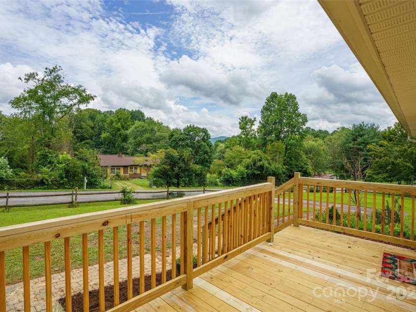 45 Armstrong Road, Etowah, NC 28729.  MLS# CAR4276177, YatesRealty ID 9369. View from the front. New deck