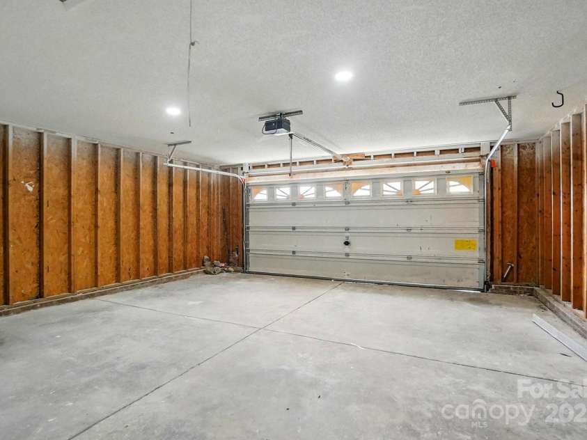 2945 Christian Scott Lane, Charlotte, NC 28214.  MLS# CAR4242532, YatesRealty ID 9370. Two car garage