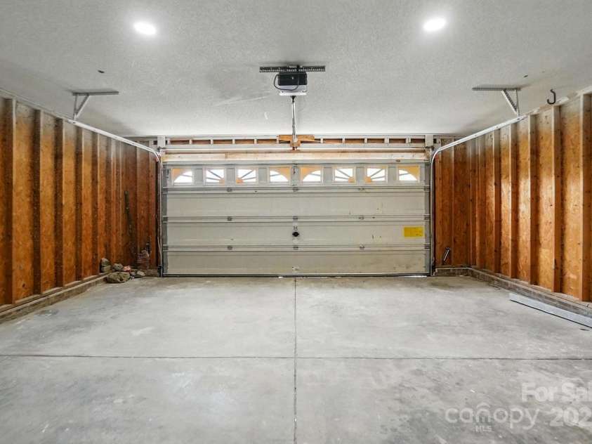 2945 Christian Scott Lane, Charlotte, NC 28214.  MLS# CAR4242532, YatesRealty ID 9370. Two car garage