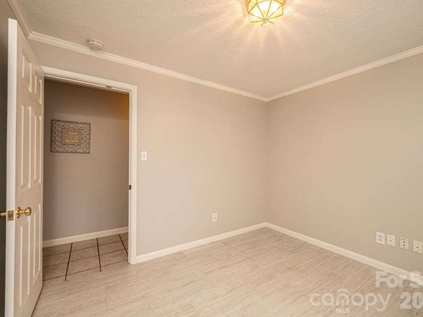 1063 4th Avenue Drive, Hickory, NC 28601.  MLS# CAR4350686, YatesRealty ID 9372. Downstairs bedroom #5