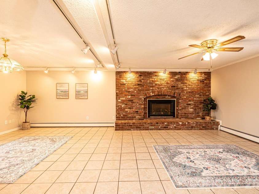 1063 4th Avenue Drive, Hickory, NC 28601.  MLS# CAR4350686, YatesRealty ID 9372. Downstairs living room