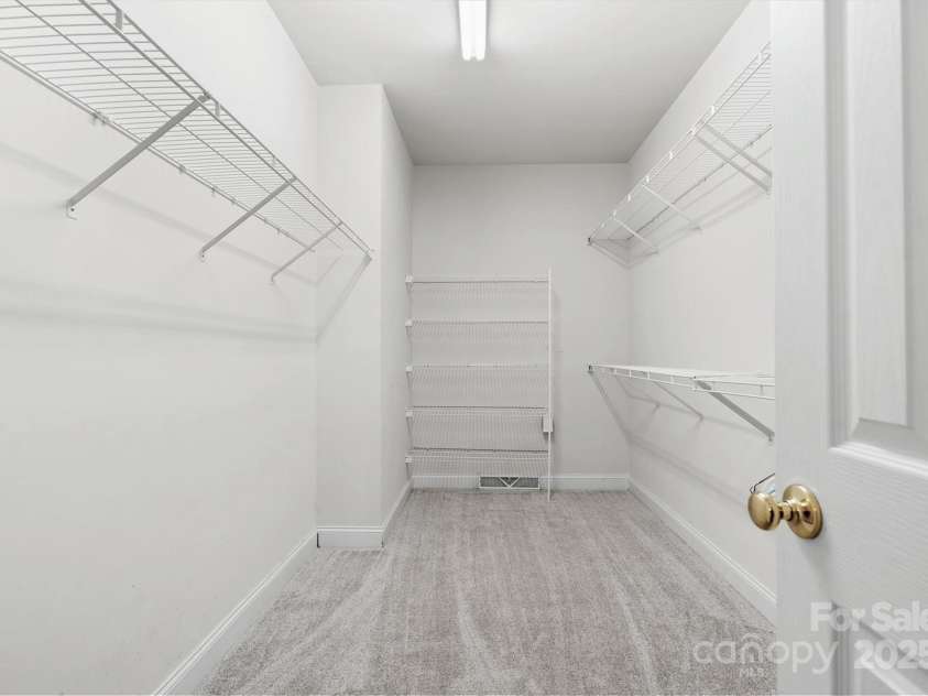 2620 Merion Hills Court, Charlotte, NC 28269.  MLS# CAR4274977, YatesRealty ID 9372. Primary Bedroom Long Closet