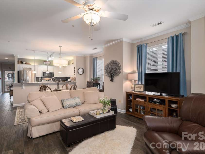 714 Northeast Drive, Davidson, NC 28036.  MLS# CAR4349837, YatesRealty ID 9377. End unit provides for extra widows in the great room.