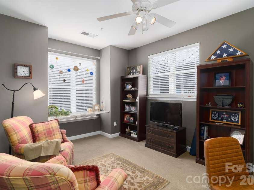 714 Northeast Drive, Davidson, NC 28036.  MLS# CAR4349837, YatesRealty ID 9377. Extra windows let the light in from this end unit.
