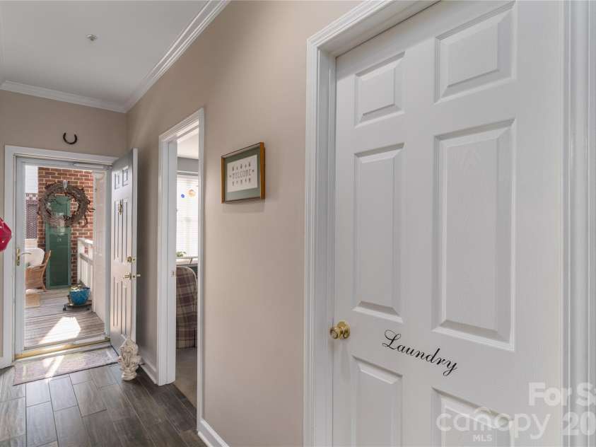 714 Northeast Drive, Davidson, NC 28036.  MLS# CAR4349837, YatesRealty ID 9377. Real Laundry Room not always found in condo living.
