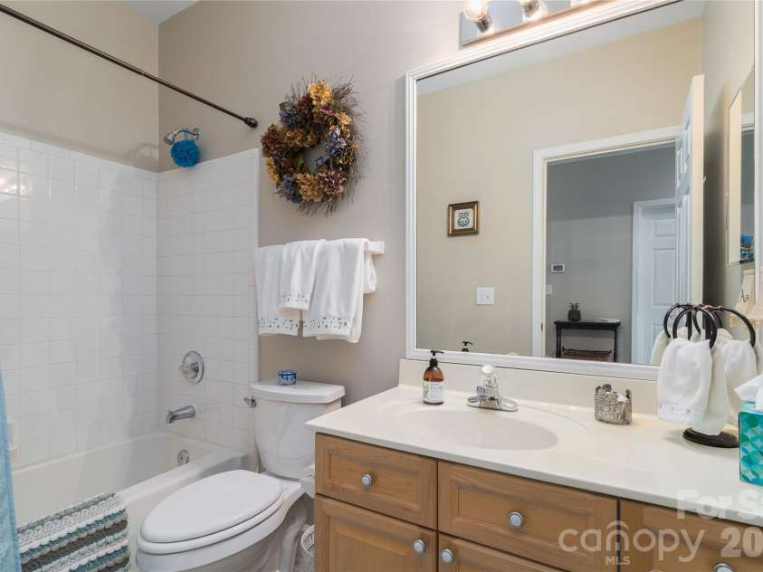 714 Northeast Drive, Davidson, NC 28036.  MLS# CAR4349837, YatesRealty ID 9377. Secondary full bath serves two bedrooms and as powder room.