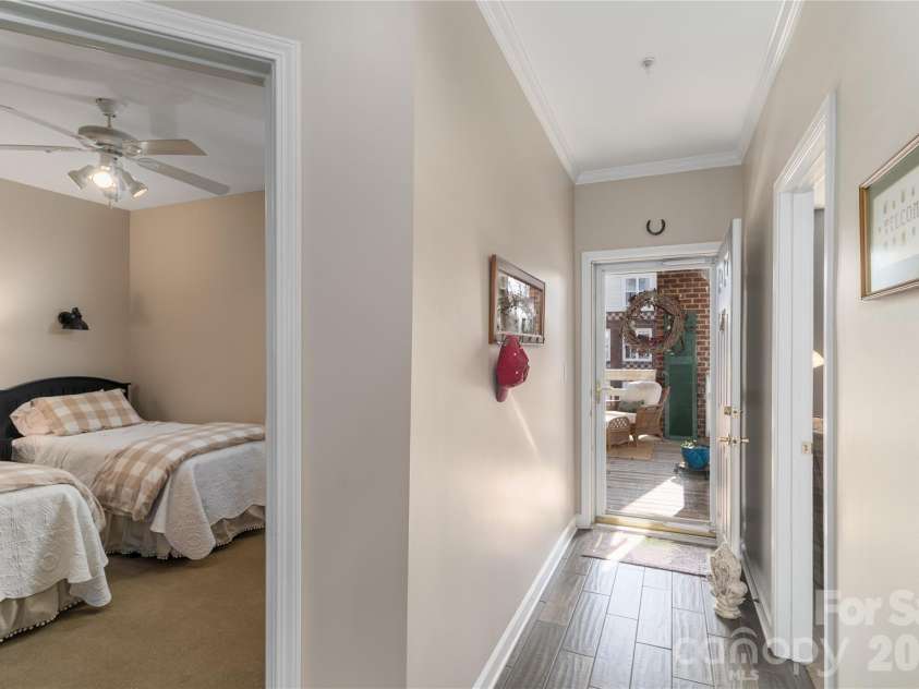714 Northeast Drive, Davidson, NC 28036.  MLS# CAR4349837, YatesRealty ID 9377. Spacious second bedroom off the hallway.