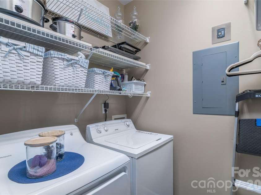 714 Northeast Drive, Davidson, NC 28036.  MLS# CAR4349837, YatesRealty ID 9377. Storage and room for full sized washer/dryer.