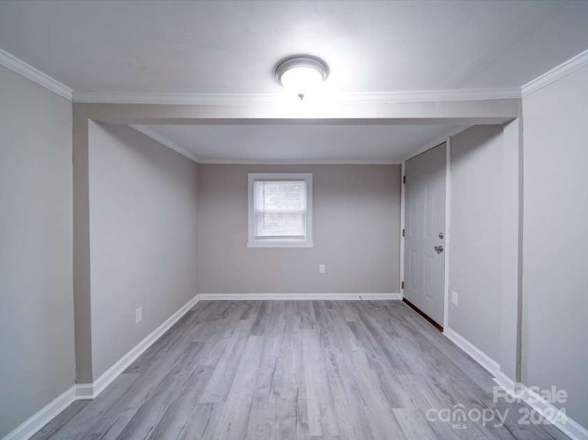 208 Oakland Drive, Lowell, NC 28098.  MLS# CAR4207278, YatesRealty ID 9378. Flex Room