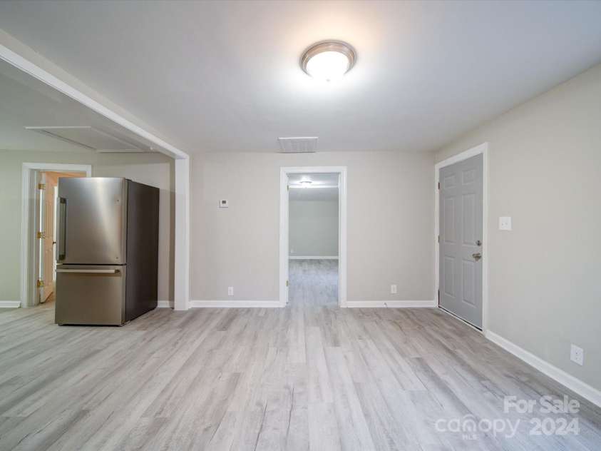 208 Oakland Drive, Lowell, NC 28098.  MLS# CAR4207278, YatesRealty ID 9378. Living Room