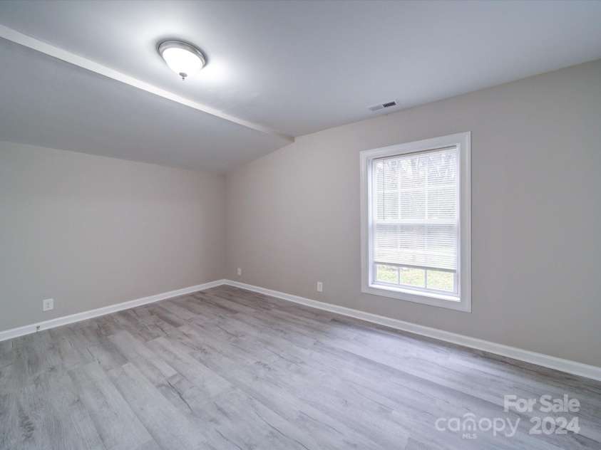 208 Oakland Drive, Lowell, NC 28098.  MLS# CAR4207278, YatesRealty ID 9378. Master Bedroom