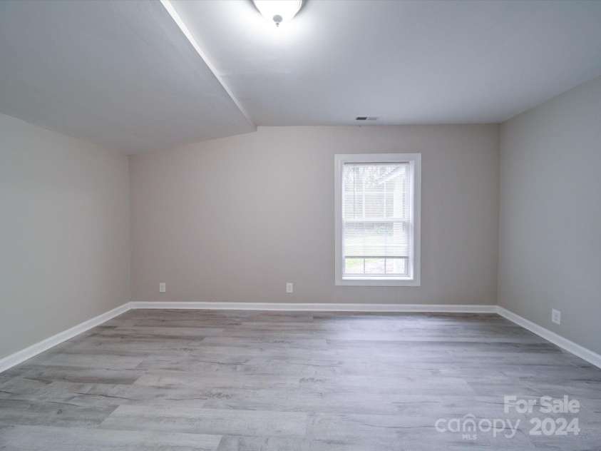 208 Oakland Drive, Lowell, NC 28098.  MLS# CAR4207278, YatesRealty ID 9378. Master Bedroom