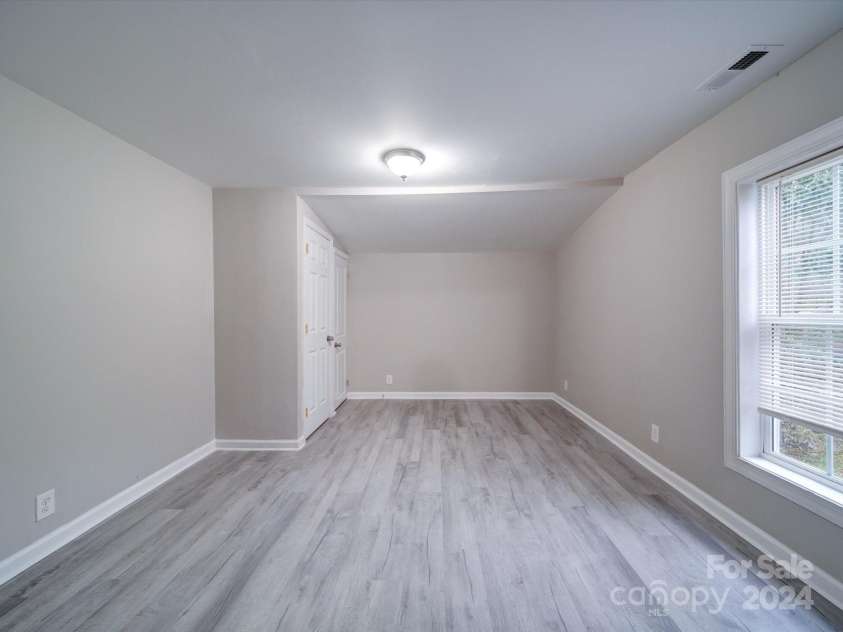 208 Oakland Drive, Lowell, NC 28098.  MLS# CAR4207278, YatesRealty ID 9378. Master Bedroom