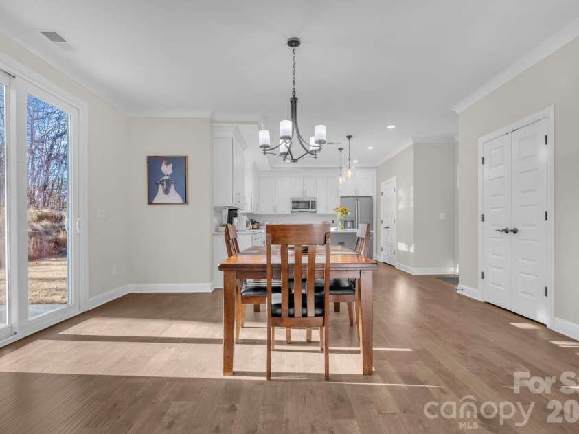 112 Sugar Hill Road, Troutman, NC 28166.  MLS# CAR4337757, YatesRealty ID 9384. Dining, sitting area open to kitchen