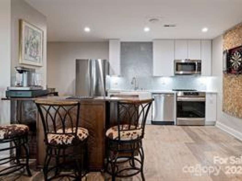 822 & 920 Preservation Trail, Columbus, NC 28722.  MLS# CAR4223854, YatesRealty ID 9386. Ground floor dining and kitchen