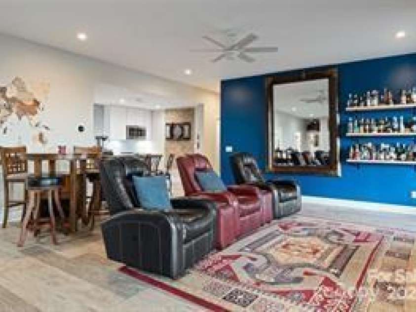 822 & 920 Preservation Trail, Columbus, NC 28722.  MLS# CAR4223854, YatesRealty ID 9386. Ground floor entertainment area