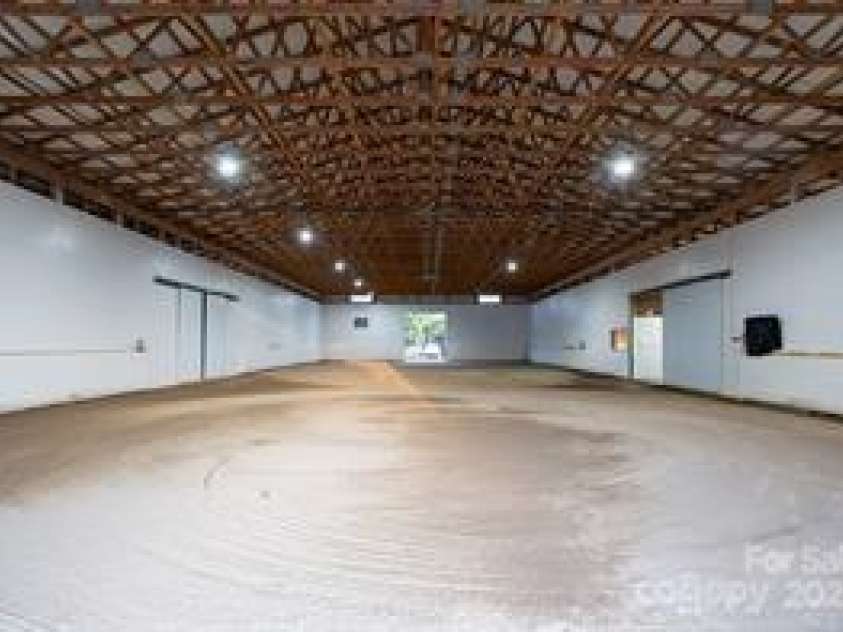 822 & 920 Preservation Trail, Columbus, NC 28722.  MLS# CAR4223854, YatesRealty ID 9386. Lighted and watered indoor arena