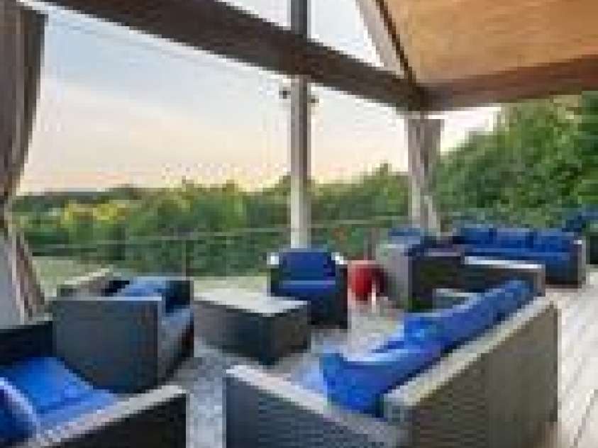 822 & 920 Preservation Trail, Columbus, NC 28722.  MLS# CAR4223854, YatesRealty ID 9386. Long range view from main house covered deck