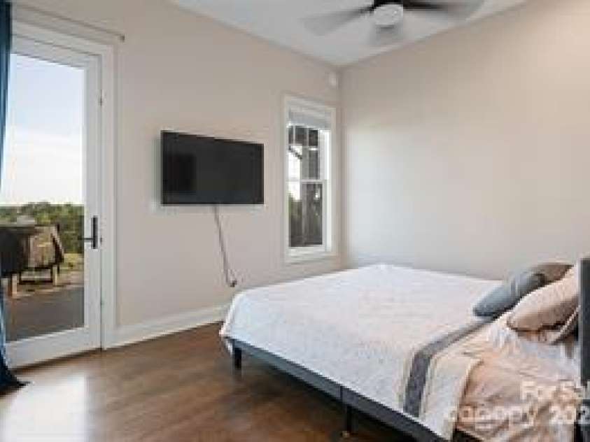 822 & 920 Preservation Trail, Columbus, NC 28722.  MLS# CAR4223854, YatesRealty ID 9386. Main house guest bedroom w\ ensuite bathroom