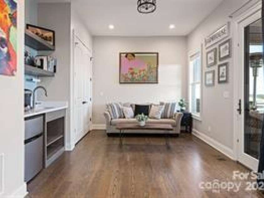 822 & 920 Preservation Trail, Columbus, NC 28722.  MLS# CAR4223854, YatesRealty ID 9386. Main house guest bedroom w\ ensuite, bathroom, sitting area and coffee bar