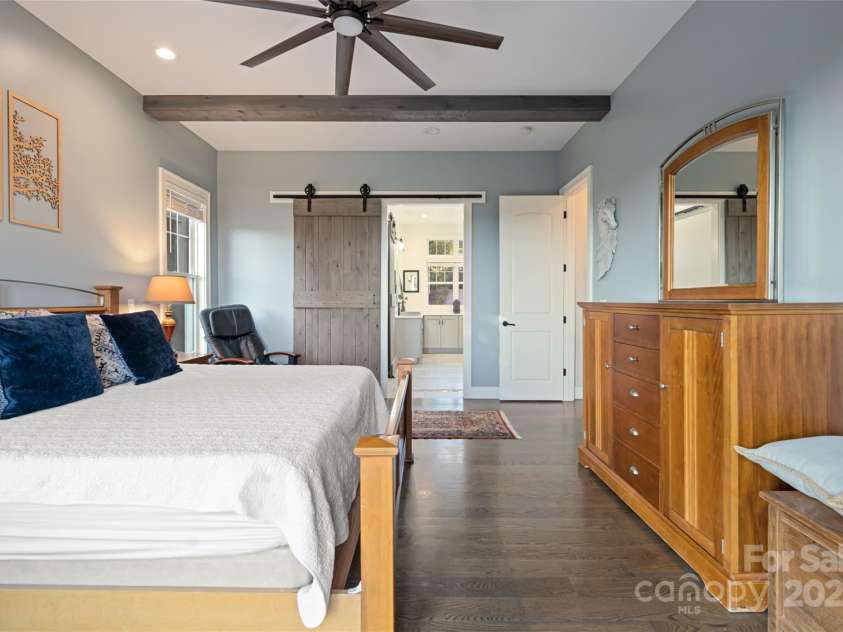 822 & 920 Preservation Trail, Columbus, NC 28722.  MLS# CAR4223854, YatesRealty ID 9386. Main house primary bedroom
