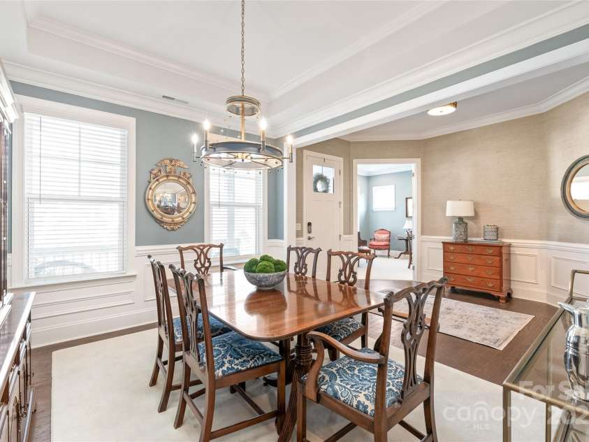 128 Shimmer Lake Lane, Belmont, NC 28012.  MLS# CAR4208573, YatesRealty ID 9390. Flooded with natural light, every corner of this home shines with warmth & elegance.