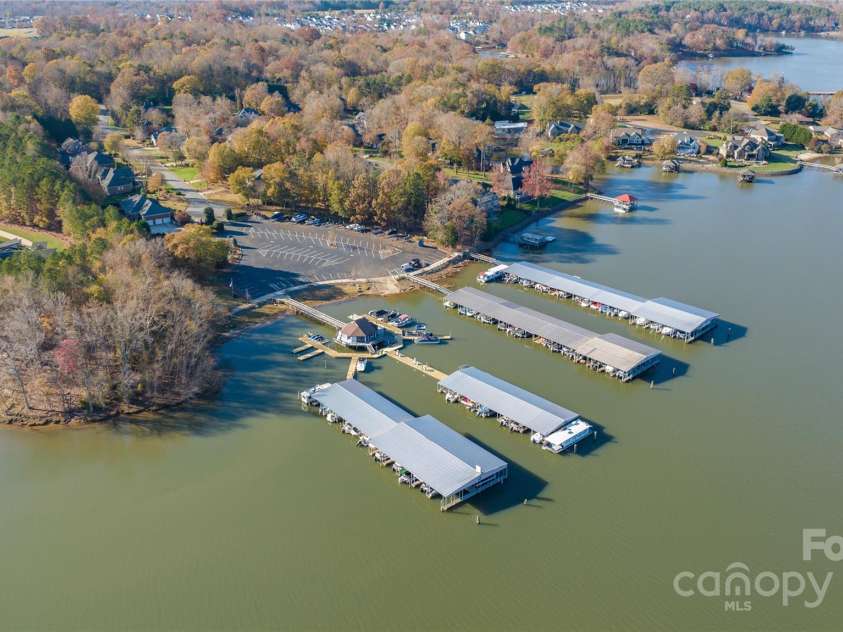 128 Shimmer Lake Lane, Belmont, NC 28012.  MLS# CAR4208573, YatesRealty ID 9390. Just down the road from Harbortown Marina, offering easy access to boating and all the joys of lake living.