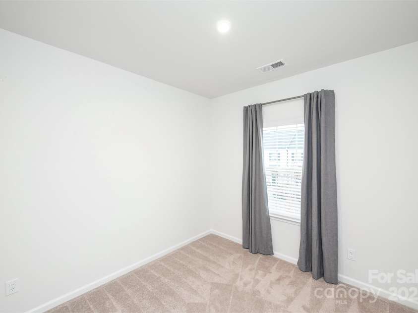 5021 Patton Drive, Gastonia, NC 28056.  MLS# CAR4328255, YatesRealty ID 9391. Secondary bedroom